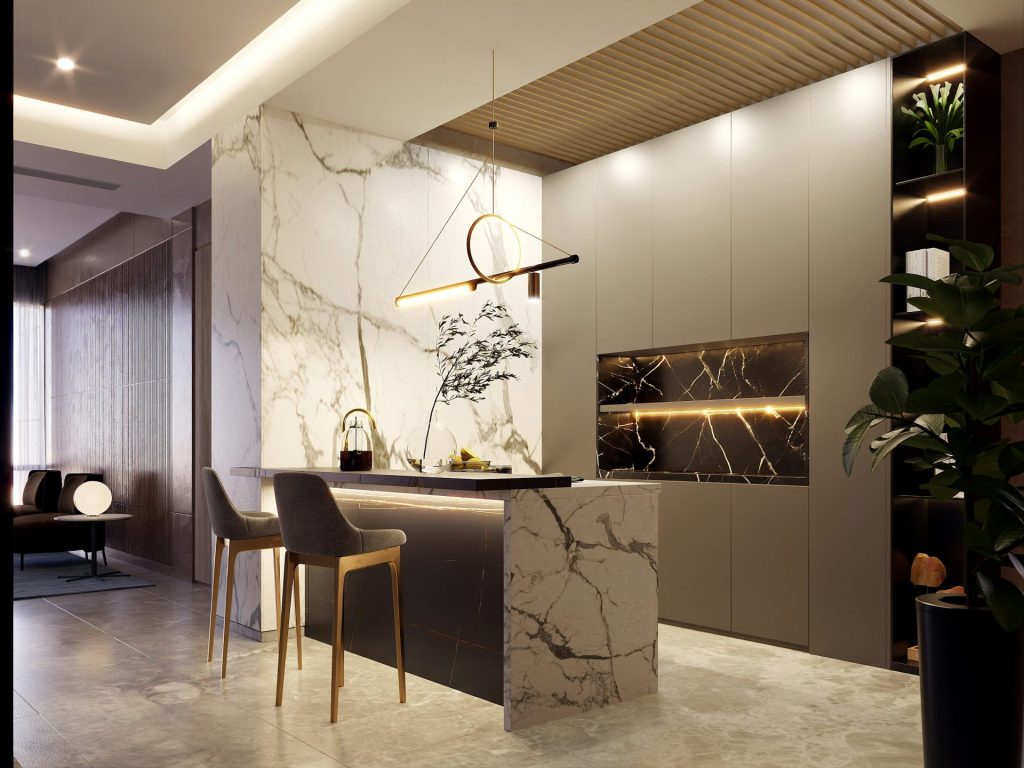 Modern kitchen island with marble accents and pendant light.